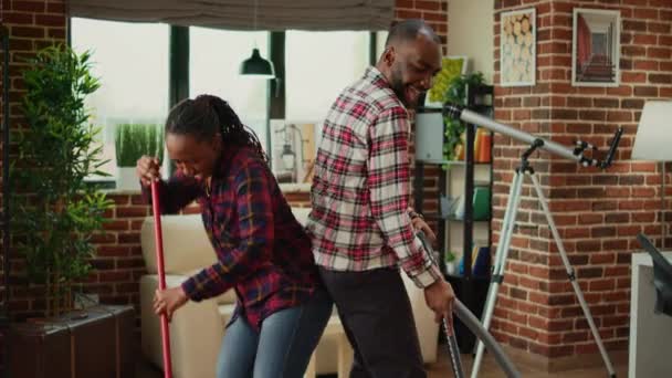 Cheerful People Showing Dance Moves Doing Spring Cleaning Having Fun — Stock videók