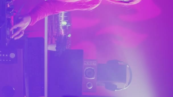 Vertical Video Cheerful Artist Playing Techno Song Using Mixer Console — Vídeos de Stock