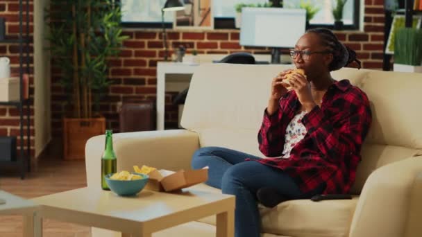 Smiling Adult Eating Hamburger Fries Alcohol Watching Favorite Action Movie — Αρχείο Βίντεο