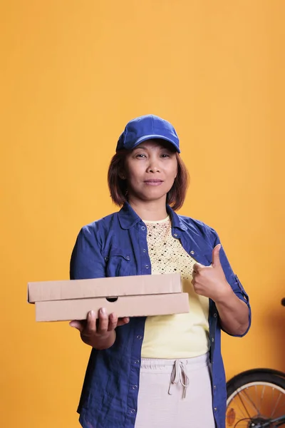 Asian Pizzeria Delivery Employee Doing Thumbs Gesture While Delivering Carton — Stock Photo, Image