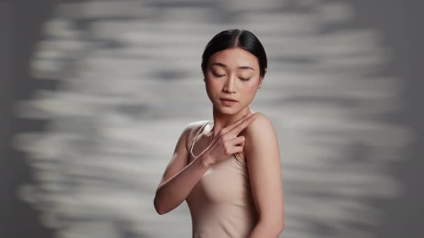 Empowering Woman Using Body Cream Camera Applying Moisturizer Shoulders Promote — Vídeo de Stock