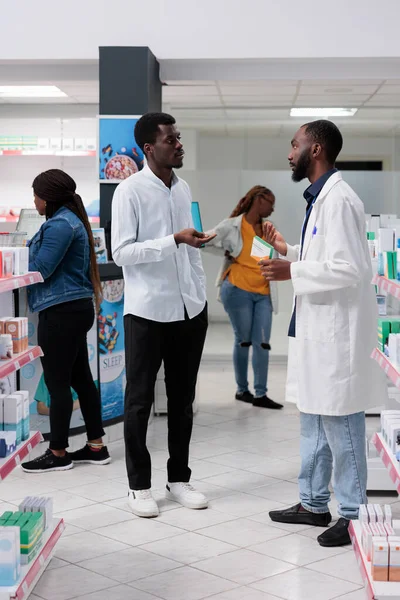 African American Customers Purchasing Medicaments Pharmacy Store Pharmacist Recommending Man — Stockfoto