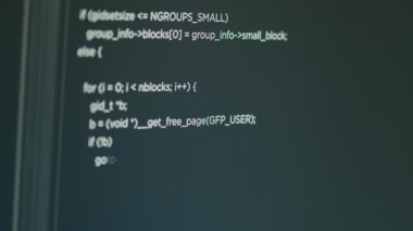 Computer of system engineer showing source code and big data in it development agency. Concept of software developer displaying programming language of database functions script. Close up.