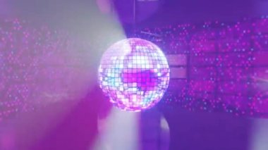 Purple disco ball spinning on VJ DJ background, pary music night. 3D render looped animation of neon dance club sphere. Glitter entertainment glowing party nighlife