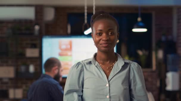 Smiling African American Businesswoman Crossing Hands Looking Camera Standing Boardroom — Video