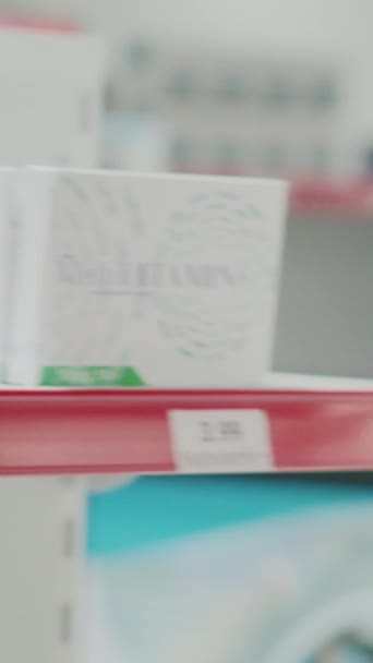 Vertical Video Male Doctor Recommending Box Pills Woman Expaining Disease — стокове відео