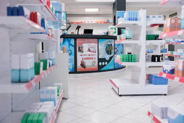 Healthcare drugstore full with pharmaceutical products and medication standing on shelves, boxes and packages with vitamins. Empty pharmacy store filled with medicaments, medicine concept.