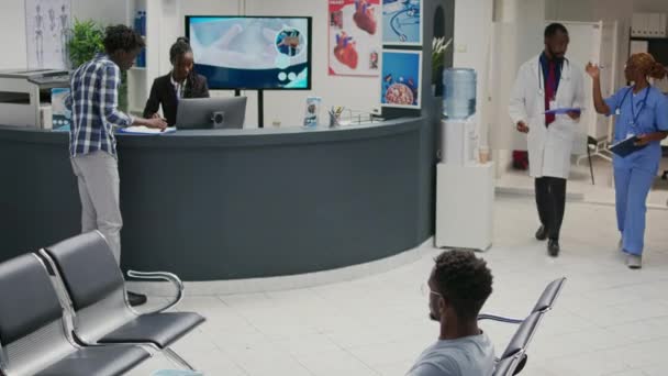 Sick Man Taking Checkup Report Files Reception Desk Preparing Fill — Vídeos de Stock