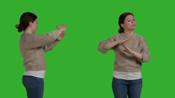 Caucasian Woman Doing Shape Symbol Hands Showing Refusal Sign Greenscreen — Αρχείο Βίντεο