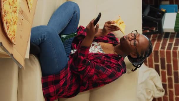 Vertical Video Cheerful Woman Eating Slice Pizza Watching Film Having — Video