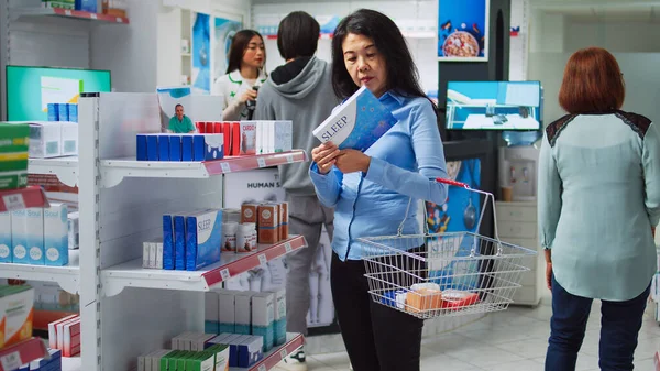 Female Customer Reading Prescription Pills Boxes Looking Medicaments Supplements Pharmacy — Stock Photo, Image