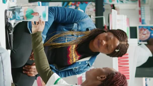 Vertical Video African American Women Checking Boxes Pills Client Looking — Vídeo de Stock