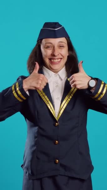 Vertical Video Young Air Hostess Giving Thumbs Studio Showing Okay — Vídeo de Stock