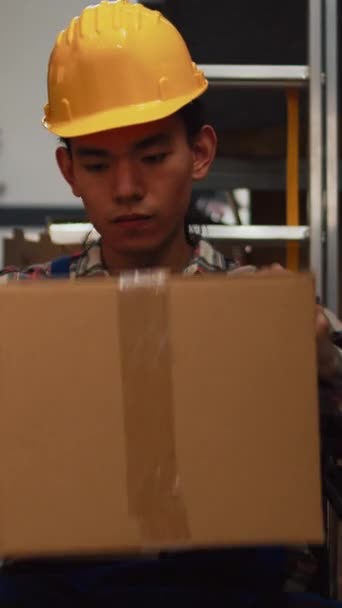 Vertical Video Asian Wheelchair User Working Warehouse Space Supplies Man — Stock Video