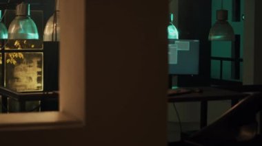 Dangerous spy gaining unauthorized access into computer system, doing phishing for security breach. Person using encryption to convert data and commit cyberbullying. Handheld shot.