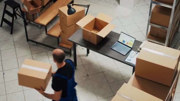 Male Entrepreneur Putting Merchandise Carton Packages Working Delivery Shipment Young — Video Stock