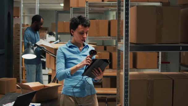 Female Employee Using Scanner Tablet Stock Inventory Scanning Bar Code — Video