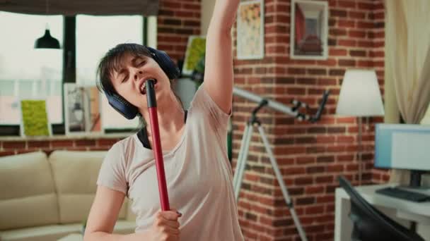 Positive Woman Listening Music Headphones Washing Apartment Floors Sweeping Dirt — Vídeos de Stock