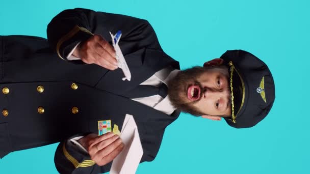 Vertical Video Aircrew Captain Playing Paper Toy Airplane Having Fun — Stok video