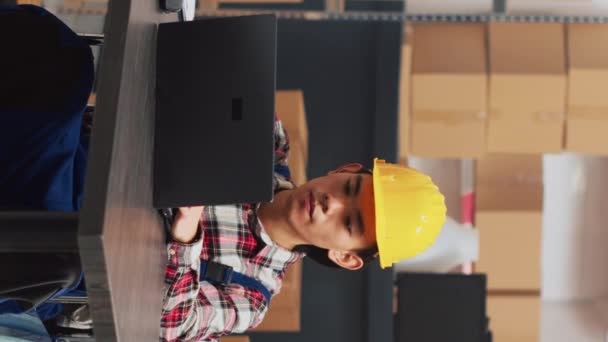 Vertical Video Asian Man Wheelchair Working Laptop Budgeting Using Stock — стокове відео