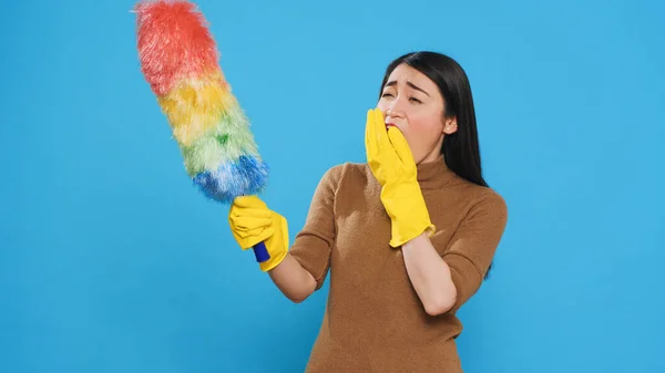 Tired Professional Maid Cleaning Furniture Dust Using Colorful Duster Cleaning — Stock Photo, Image
