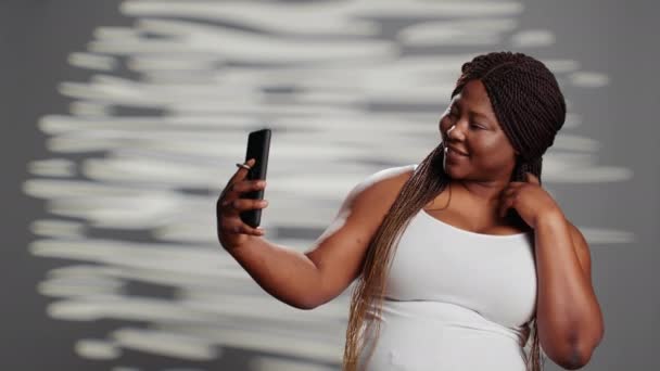 African American Woman Feeling Confident Taking Photos Using Smartphone Show — Video