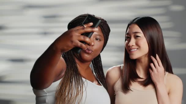 Diverse Friends Taking Photos Mobile Phone Studio Expressing Self Love — Vídeos de Stock