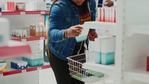 Female Customer Taking Medical Supplies Shelves Looking Supplements Buy Prescription — Stockvideo