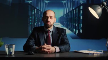 POV of database admin talking on remote videocall in data center storage room, technician working in artificial intelligence render farm. IT administrator using online videoconference call.