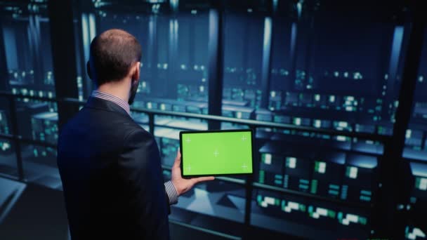 Support Specialist Using Tablet Greenscreen Display Modern Data Center Checking — Stockvideo
