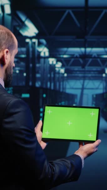 Vertical Video System Engineer Checking Green Screen Display Tablet Running — Vídeo de Stock