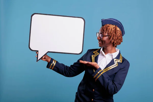 African American Female Flight Attendant Holding Speech Balloon Smiling Air — Stockfoto