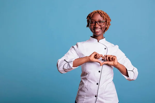 African American Woman Kitchen Uniform Happy Smiling Making Heart Symbol — Stock Photo, Image