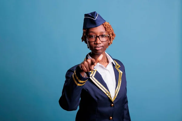 Serious African American Curly Hair Air Hostess Studio Portrait Pointing — Stock Photo, Image