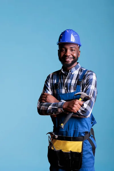 Happy African American Builder Holding Hammer Posing Studio Blue Background — Foto Stock