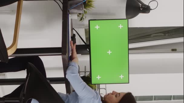 Vertical Video Business Manager Analyzing Greenscreen Display Chekcing Isolated Copyspace — Video Stock