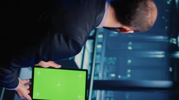 Vertical Video Data Center Technician Holding Tablet Green Screen Server — Stock Video