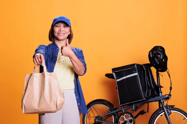 Happy Deliverywoman Doing Aprproval Sign While Delivering Take Away Food — Foto Stock
