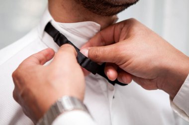 Groom in his weeding day in preparation. Celebration and wedding