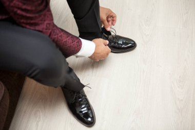Groom in his weeding day in preparation. Celebration and wedding