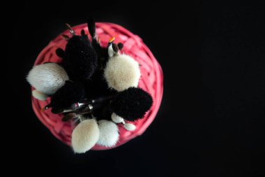 Make up and cosmetics products on black background. Professional Cosmetics