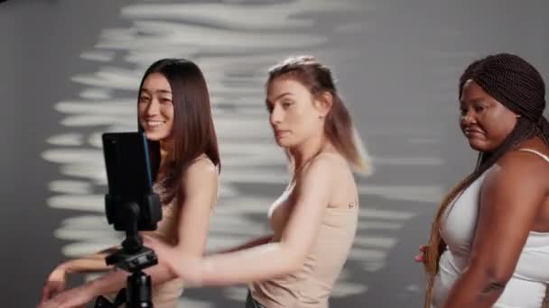 Young Beauty Models Dancing Acting Funny Camera Using Phone Studio — Vídeo de Stock