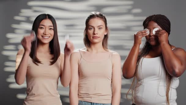 Young Models Doing Three Wise Monkeys Sign Cotton Pads Creating — Vídeo de Stock