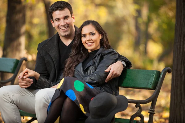 Happy Couple Sitting Bench Autumn Park —  Fotos de Stock