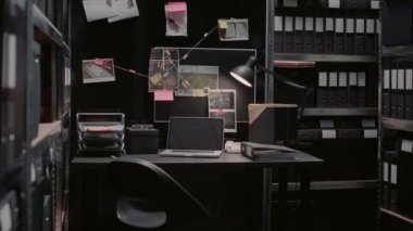 Evidence board with case files or investigation clues on police archive wall map, surveillance phots and witness statements. Empty law enforcement office filled with criminal records.