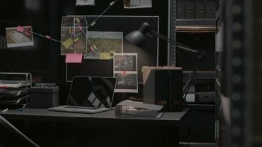 Empty incident room equipped with photos and witness information, criminal investigation with evidence map on wall board. Private detective space filled with photos and case files records.