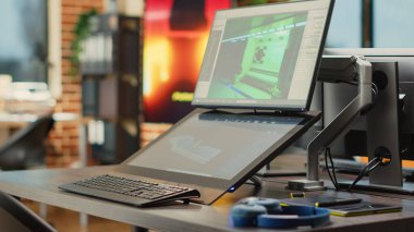 Birden fazla monitörde prototip ya da oyun bilgisi geliştirmek için kullanılan boş çizim stüdyosu. Yüksek teknoloji bilgisayarlı, teknik içerikli sanatsal yazılım yürüten yaratıcı ajans ofisi.