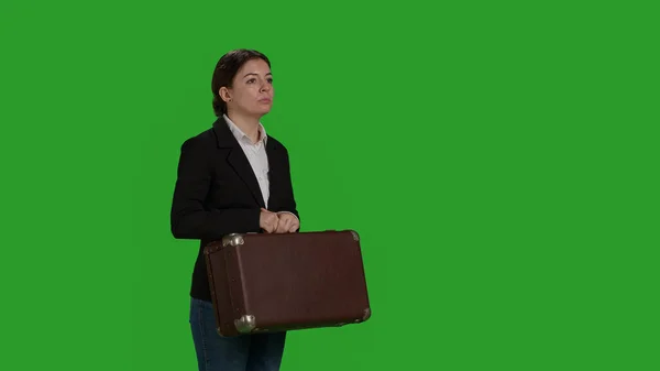 Side View Corporate Worker Carrying Suitcase Camera Posing Green Screen — Zdjęcie stockowe