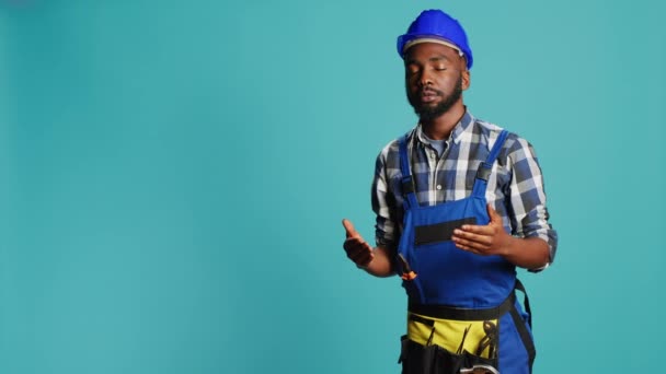 Professional Builder Almost Fainting Being Wobbly Standing Blue Background Male — Stock Video