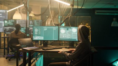 Man creating breach of security after gaining unauthorized access to system, hacking computer to steal government data. Hacker doing hacktivism work, ransomware and identity theft concept.